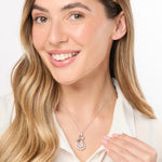 Load image into Gallery viewer, A double pave teardrop pendant made of rhodium finished sterling silver, featuring AAA quality cubic zirconia, suspended from a circle element-JOOLS by Jenny Brown
