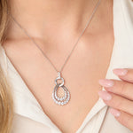 Load image into Gallery viewer, A double pave teardrop pendant made of rhodium finished sterling silver, featuring AAA quality cubic zirconia, suspended from a circle element-JOOLS by Jenny Brown
