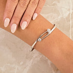 Load image into Gallery viewer, Sterling Silver Open Wishbone Bangle  With A Two Offset  Cubic Zirconia Stones- JOOLS By Jenny Brown
