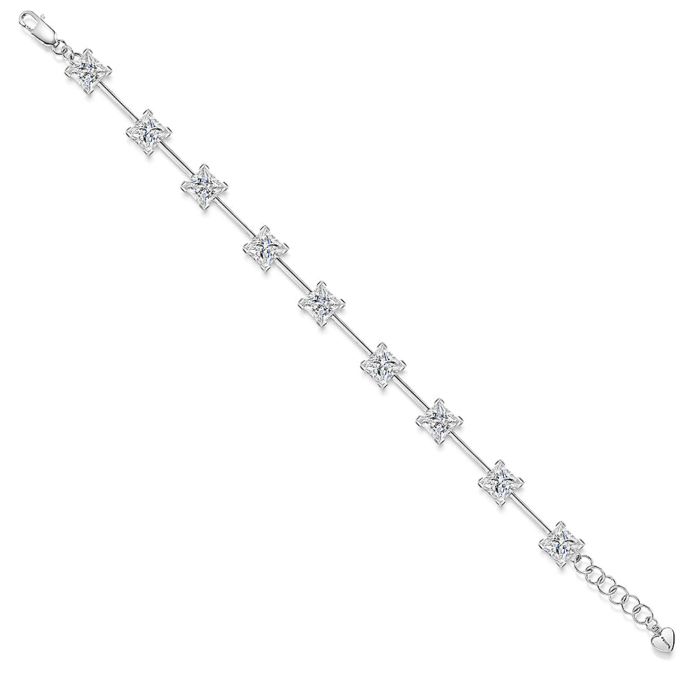 Sterling silver bar bracelet with princess cut cubic zirconia stones, featuring a chain extension.-JOOLS by Jenny Brown