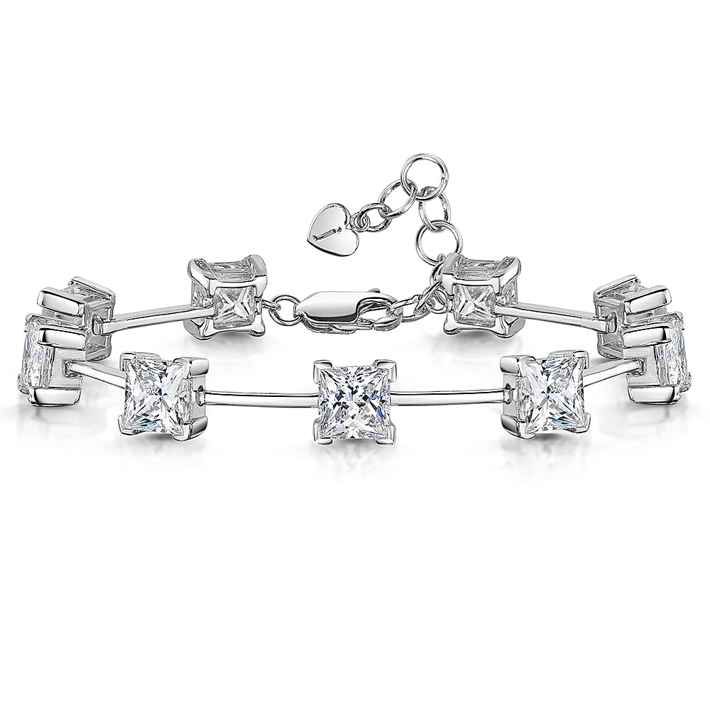 Sterling silver bar bracelet with princess cut cubic zirconia stones, featuring a chain extension.-JOOLS by Jenny Brown