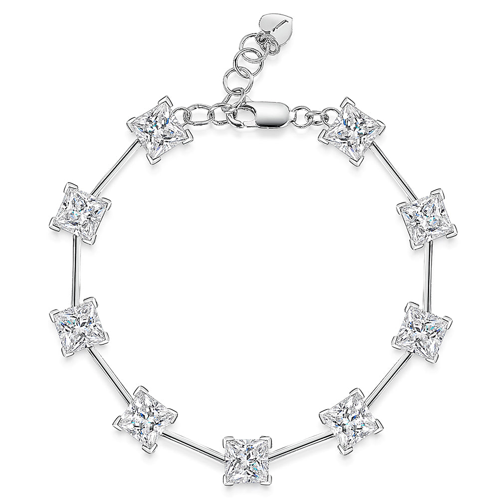 Sterling silver bar bracelet with princess cut cubic zirconia stones, featuring a chain extension.-JOOLS by Jenny Brown