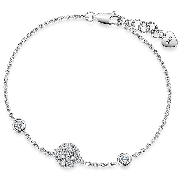 Delicate sterling silver bracelet featuring a central round pavé-set cubic zirconia bead, accented by two bezel-set round cubic zirconia stones on a fine chain with lobster clasp and 925 heart-tag detail.