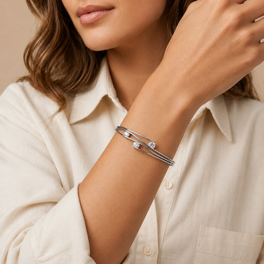 Sterling Silver Bangle  Set With Three Cubic Zirconia Oval StonesBracelets - JOOLS By Jenny Brown
