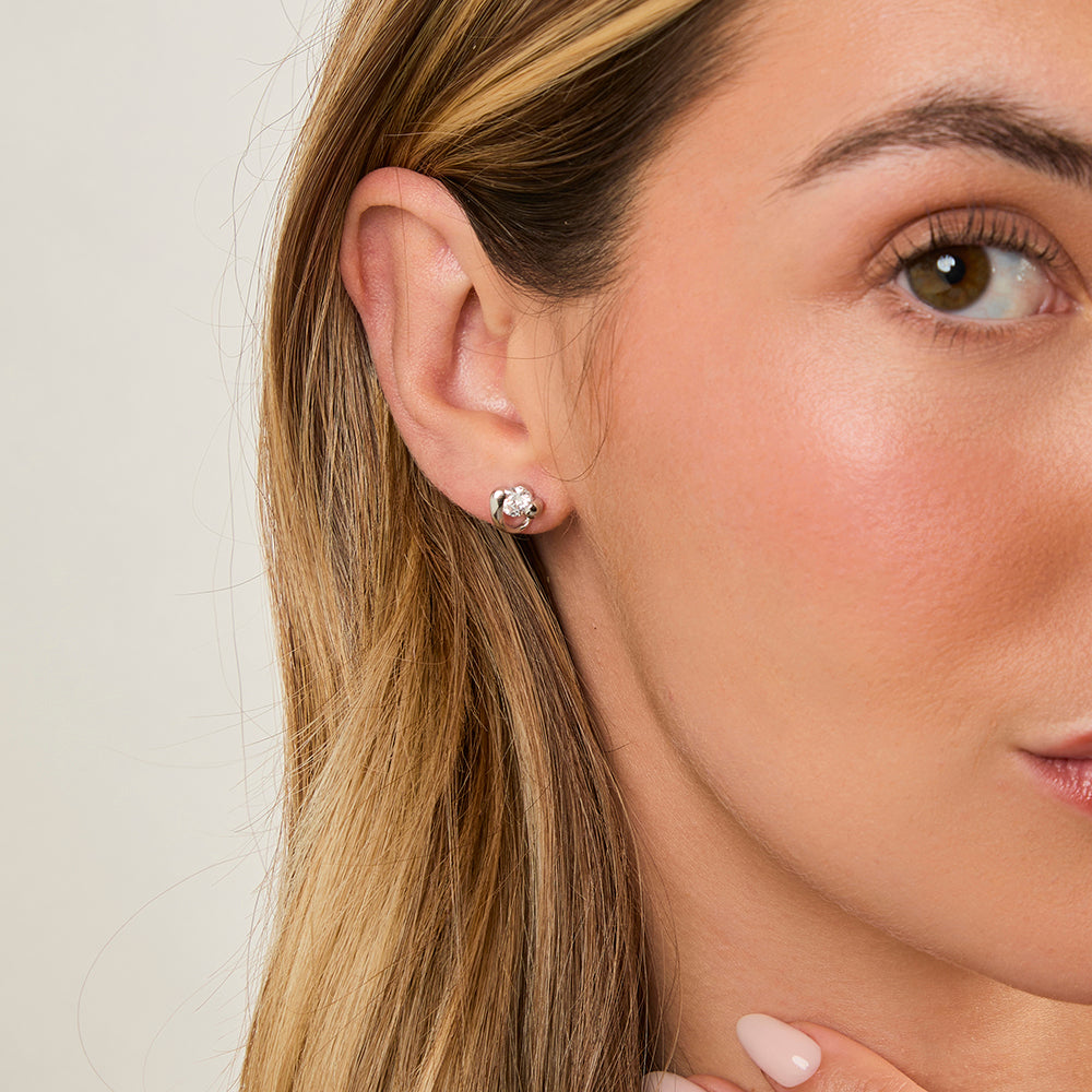 Sterling Silver Offset Heart Stud Earrings Set With A  Quarter Carat Cubic Zirconia - JOOLS By Jenny Brown