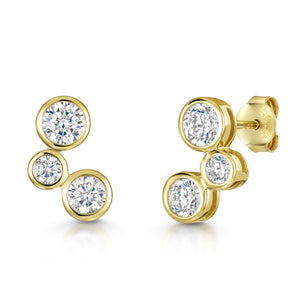 18ct gold vermeil over sterling silver ear climber earrings with three graduated round CZ stones in bubble bezel settings.