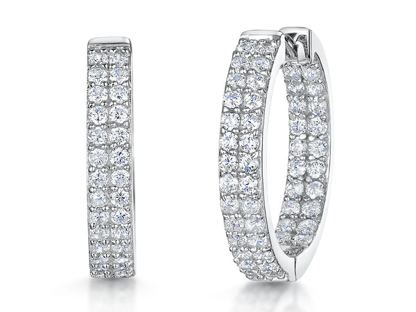 A pair of sterling silver hoop earrings with a double row of cubic zirconia stones.-JOOLS by Jenny Brown