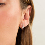 Load image into Gallery viewer, Sterling Silver Twist Huggie Earrings - JOOLS By Jenny Brown
