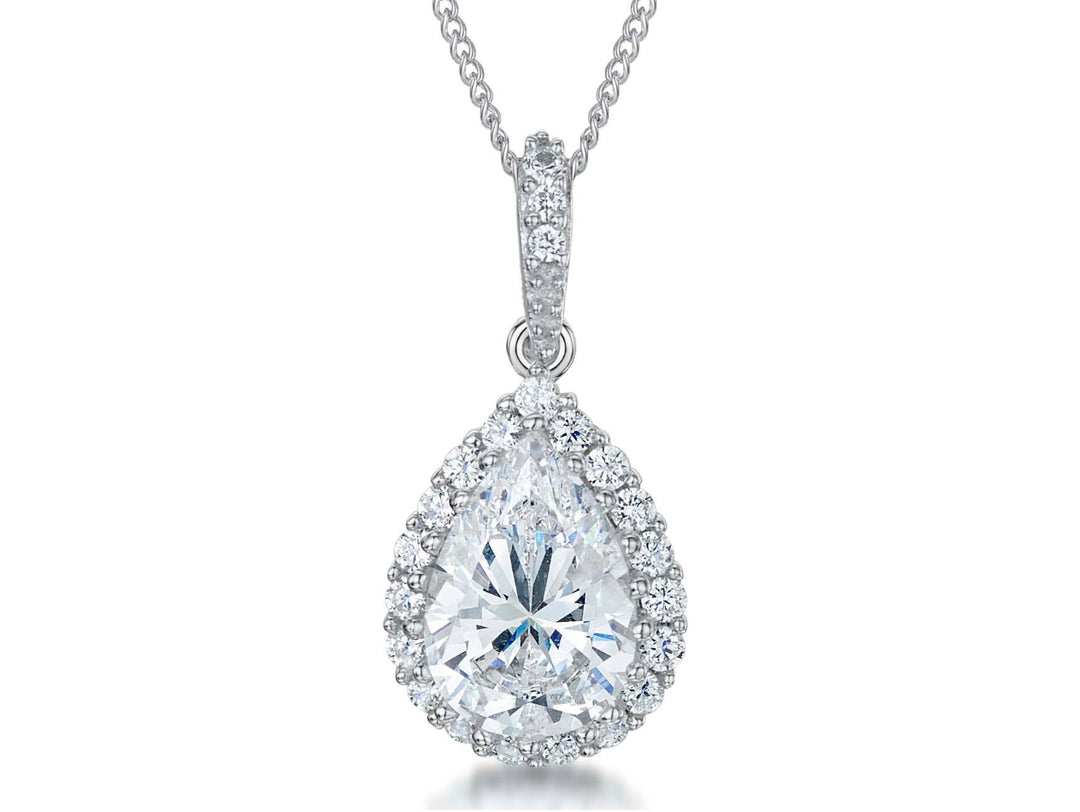 A sterling silver pendant with a pear-shaped cubic zirconia centerpiece surrounded by smaller cubic zirconia stones, presented on a chain-JOOLS by Jenny Brown