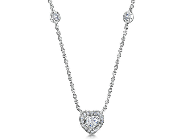 A sterling silver necklace with a heart-shaped pendant encircled by smaller cubic zirconia stones, accompanied by two larger stones on the side,-JOOLS by Jenny Brown