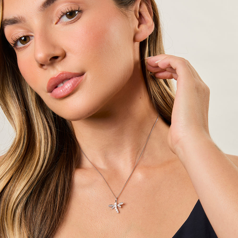 A sterling silver dragonfly pendant with four claw cubic zirconia wings -JOOLS by Jenny Brown