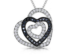 Load image into Gallery viewer, Sterling Silver Three Heart Pendant With Black and White Zirconia - JOOLS By Jenny Brown
