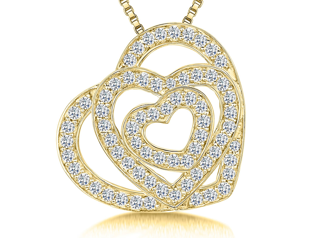 A yellow gold vermeil pendant with three interlocking hearts, each studded with cubic zirconia stone-JOOLS by Jenny Brown