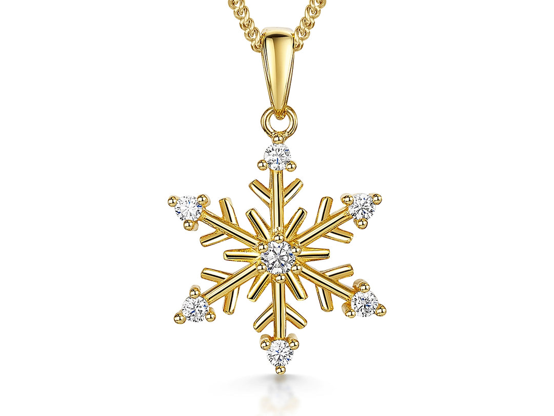 A yellow gold snowflake pendant with seven cubic zirconia stones-JOOLS by Jenny Brown