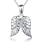 Load image into Gallery viewer, Sterling Silver Wing Pendant Set With A Cubic Zirconia Heart Centre
