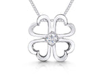 Load image into Gallery viewer, Sterling silver open four leaf clover pendant with a 3mm central cubic zirconia, attached to a silver chain-JOOLS by Jenny Brown
