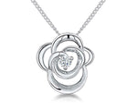 Load image into Gallery viewer, Sterling silver open twisted flower pendant with a cubic zirconia center, attached to a silver chain-JOOLS by Jenny Brown
