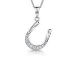 Load image into Gallery viewer, A sterling silver horseshoe pendant pave set with cubic zirconia, on an adjustable chain.-JOOLS by Jenny Brown

