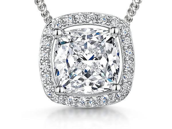 A sterling silver cushion cut halo cubic zirconia pendant with a 3 carat equivalent, featuring a surrounding stones and an adjustable chain-JOOLS by Jenny Brown