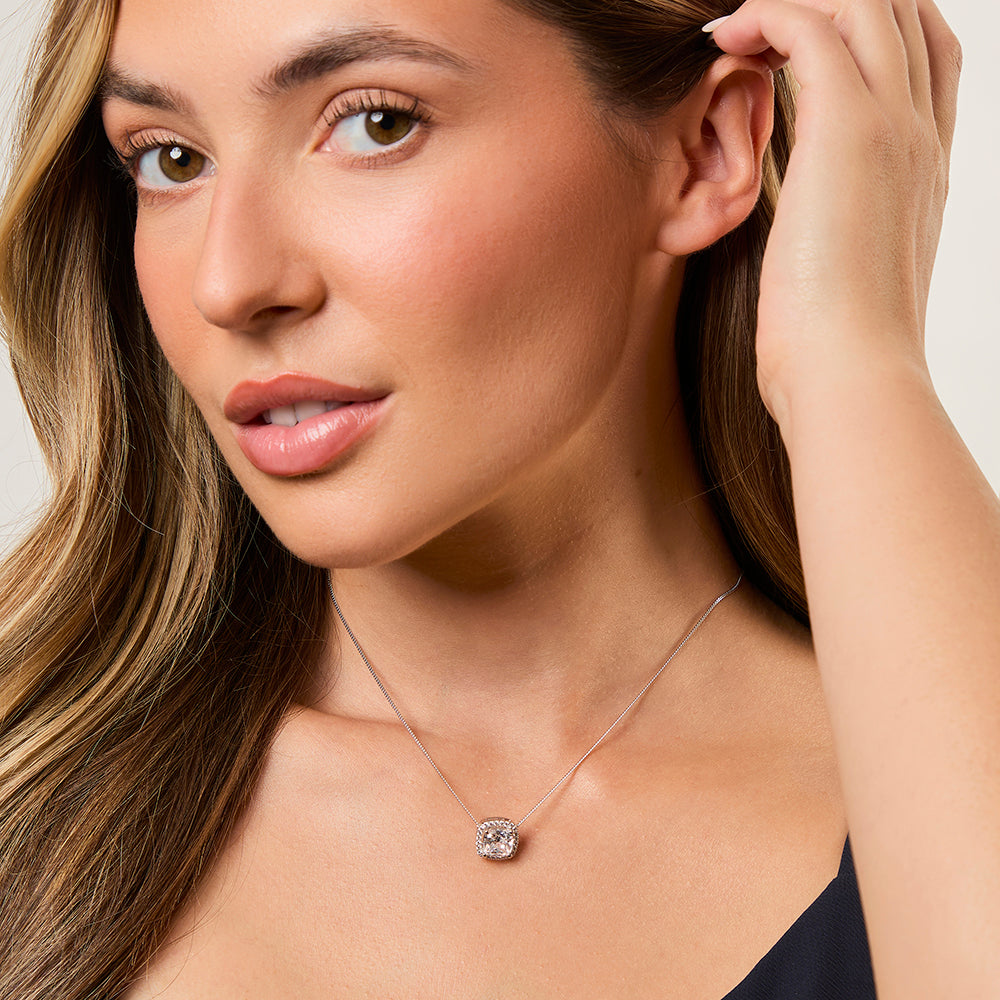 A sterling silver cushion cut halo cubic zirconia pendant with a 3 carat equivalent, featuring a surrounding stones and an adjustable chain-JOOLS by Jenny Brown