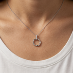 Load image into Gallery viewer, Sterling Silver Textured Circle Pendant With CZ Bale
