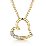 Load image into Gallery viewer, Gold heart-shaped necklace with embedded diamonds on a white background
