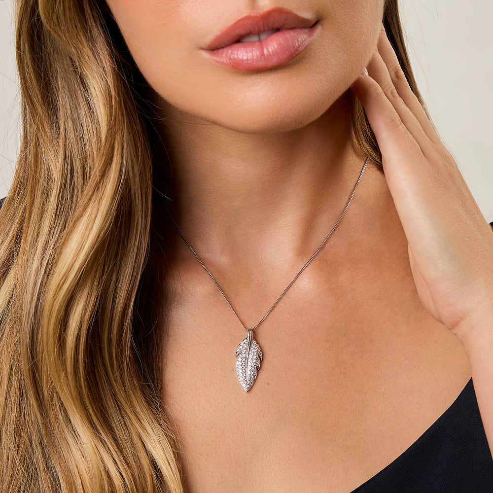 A sterling silver feather pendant set with cubic zirconias-JOOLS by Jenny Brown