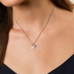 Load image into Gallery viewer, A sterling silver necklace with a small pave set butterfly pendant made of cubic zirconia stones-JOOLS by Jenny Brown
