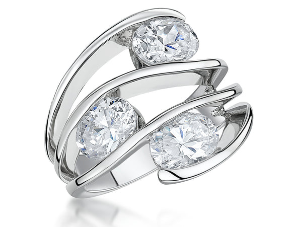 A sterling silver ring with three oval-shaped cubic zirconia stones, set in an offset design with a rhodium finish-JOOLS by Jenny Brown