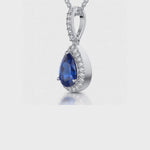 Load and play video in Gallery viewer, video clip of Sterling Silver Sapphire Blue Zirconia Teardrop Pendant - JOOLS By Jenny Brown
