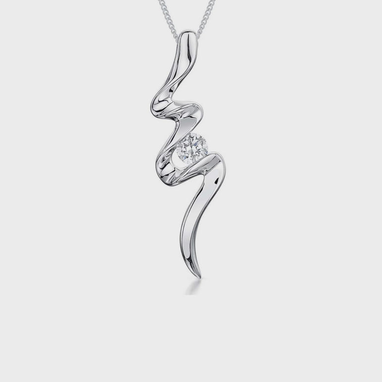 A sterling silver flash style pendant with a cubic zirconia stone, attached to a silver chain, with a rhodium finish. - JOOLS by Jenny Brown