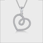 Load and play video in Gallery viewer, Sterling Silver Open Twisted Heart Pendant Set With Cubic Zirconia Stones-JOOLS by Jenny Brown
