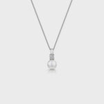 Load and play video in Gallery viewer, Sterling Silver Pearl Pendant Topped With A Cubic Zirconia - JOOLS By Jenny Brown
