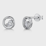 Load and play video in Gallery viewer, Sterling Silver Open Swirl Circle Stud Set With Offset Cubic Zirconia JOOLS by Jenny Brown
