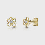 Load and play video in Gallery viewer, A pair of yellow gold flower-shaped stud earrings with a central cubic zirconia-JOOLS by Jenny Brown
