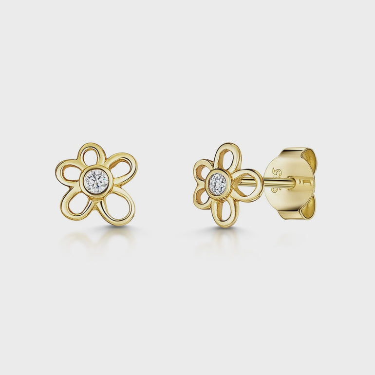 A pair of yellow gold flower-shaped stud earrings with a central cubic zirconia-JOOLS by Jenny Brown