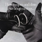 Load and play video in Gallery viewer, Sterling Silver Extra Large Hoop Cubic Zirconia Earrings
