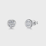 Load and play video in Gallery viewer, Sterling Silver Cubic Zirconia Half Carat Rub Over Stud Earrings JOOLS by Jenny Brown
