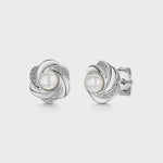 Load and play video in Gallery viewer, Sterling Silver And Pearl Earrings Set In A Twisted Spiral Surround.  - JOOLS By Jenny Brown
