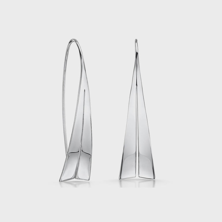 A pair of sterling silver sail shape pull through earrings.