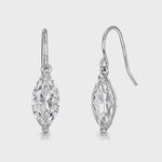 Load and play video in Gallery viewer, A pair of sterling silver drop earrings with marquise cubic zirconia stones in a two claw setting.
