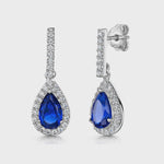 Load and play video in Gallery viewer, Dark blue pear-cut halo stud earrings in silver
