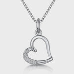 Load and play video in Gallery viewer, Sterling Silver Half Set CZ Heart Pendant
