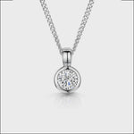 Load and play video in Gallery viewer, A sterling silver solitaire pendant with a round  quarter carat cubic zirconia stone, attached to a silver chain.
