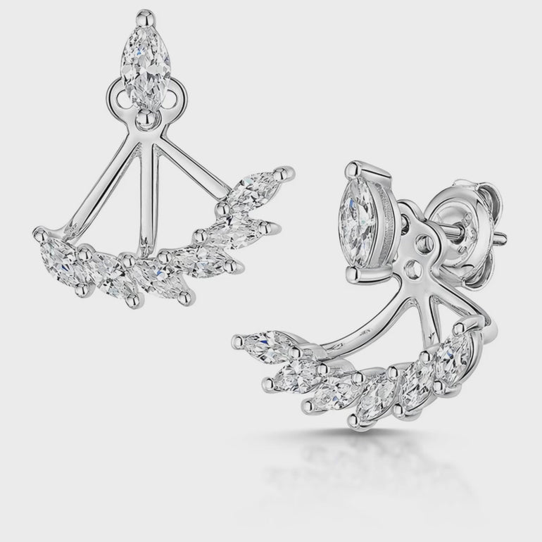 A pair of sterling silver jacket earrings featuring marquise cut cubic zirconia stones, with the earrings detachable at the base allowing one to wear as solitaire studs.