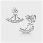 Load and play video in Gallery viewer, A pair of sterling silver jacket earrings featuring a solitaire cubic zirconia stud and a row of smaller cubic zirconia stones, presented against a white background.


