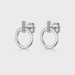 Load and play video in Gallery viewer, A pair of sterling silver circle stud earrings with cubic zirconia stones set bale-JOOLS by Jenny Brown
