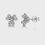 Load and play video in Gallery viewer, A pair of sterling silver double flower petal earrings adorned with white zirconia stones-JOOLS by Jenny Brown
