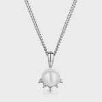 Load and play video in Gallery viewer, A sterling silver necklace with a pearl pendant surrounded by cubic zirconia stones,-JOOLS by Jenny Brown
