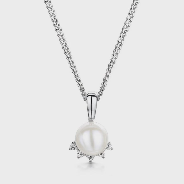 A sterling silver necklace with a pearl pendant surrounded by cubic zirconia stones,-JOOLS by Jenny Brown